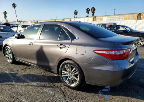 2015 Toyota Camry Hybrid from USA, damaged, VIN 4T1BD1FK4FU169348